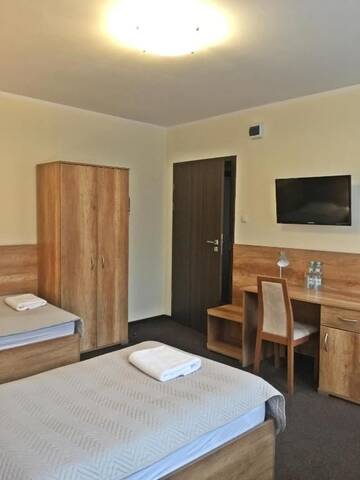 Фото номера Двухместный номер с 2 отдельными кроватями Отель Hotel Vector г. Тарново-Подгурне 15